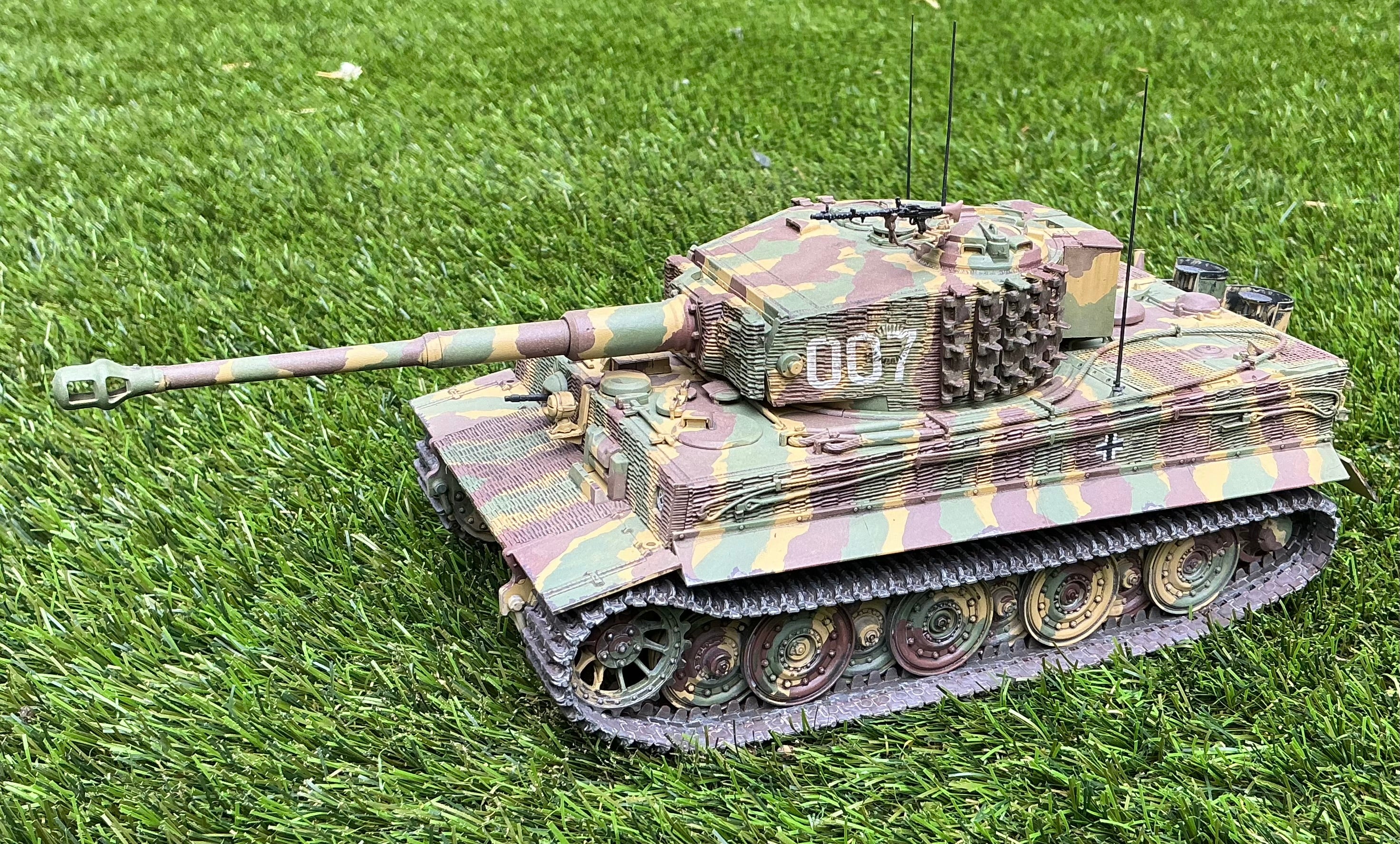 Completed 1:35 scale model of a tiger 1 in a German WW2 camouflage pattern.